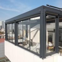 Créer une véranda sur une terrasse d&rsquo;appartement : le guide ultime